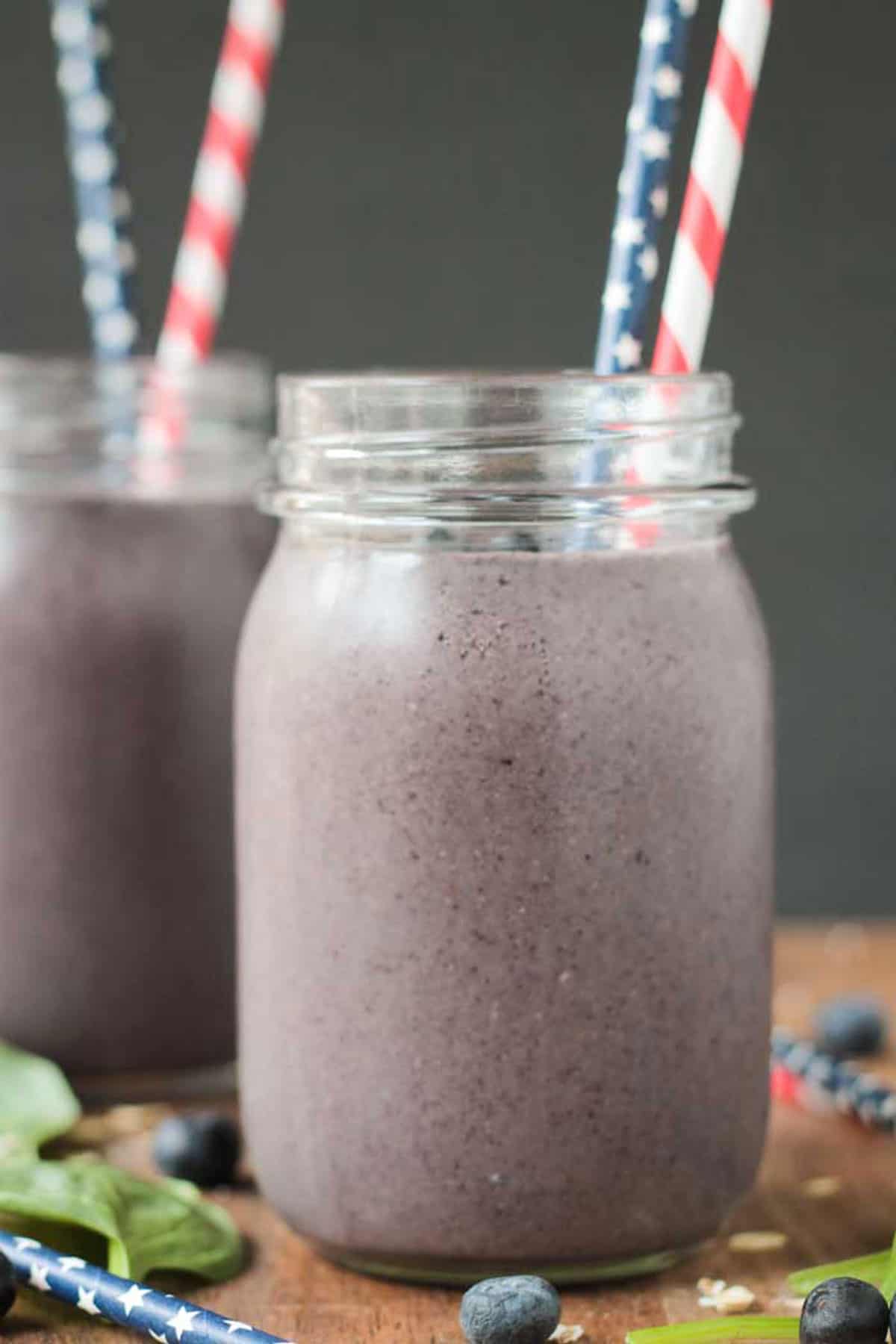 purple hued drink in a glass mason jar