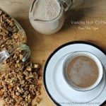 cup of coffee next to a jar of granola