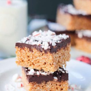 Chocolate Peppermint Rice Crispy Treat stacked two high on a plate.