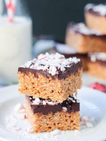 Chocolate Peppermint Rice Crispy Treat stacked two high on a plate.