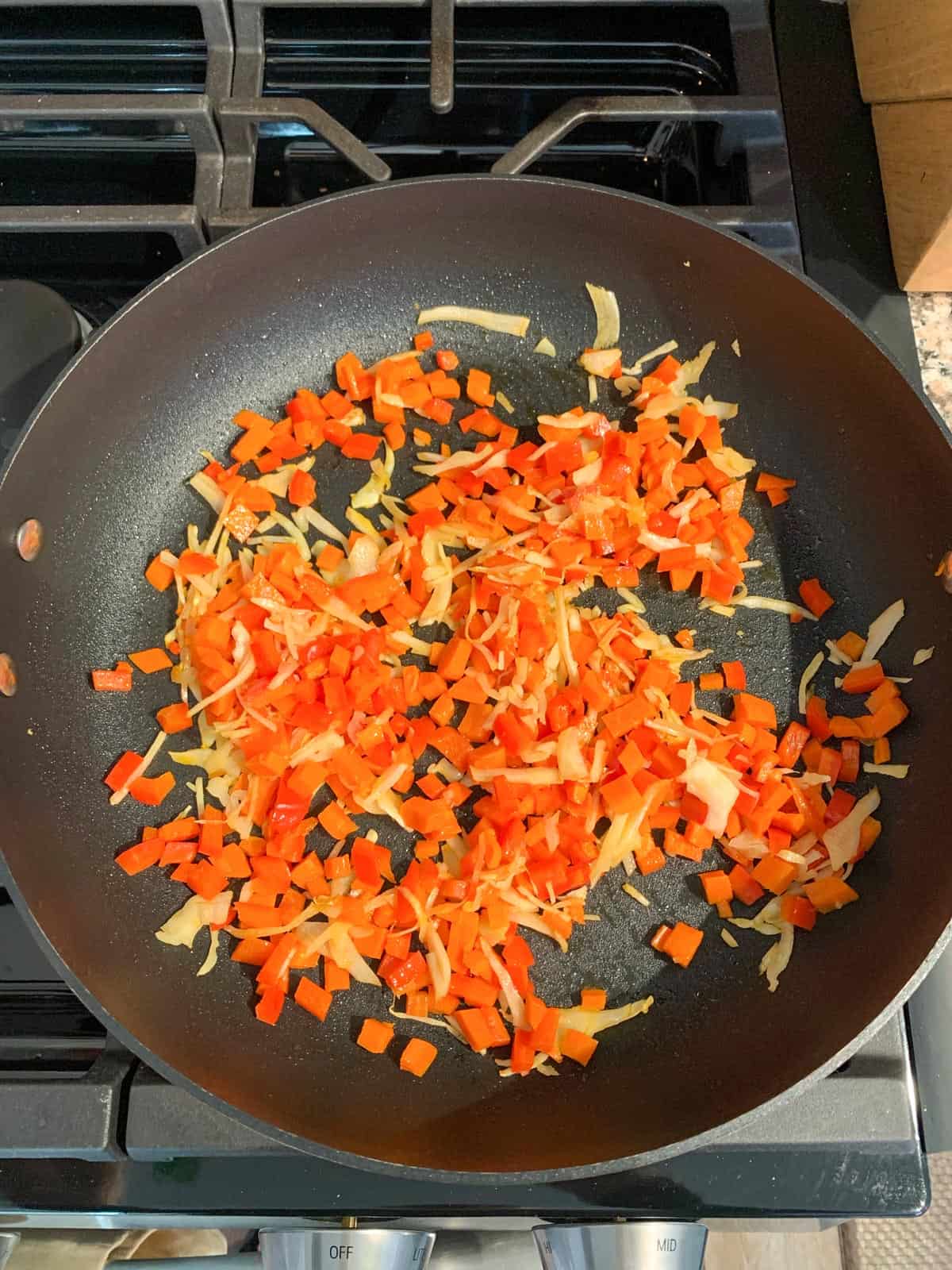 Sautéed vegetables in a skillet.