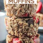 Three strawberry baked oatmeal muffins stacked.