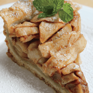 slice of apple pie garnished with mint