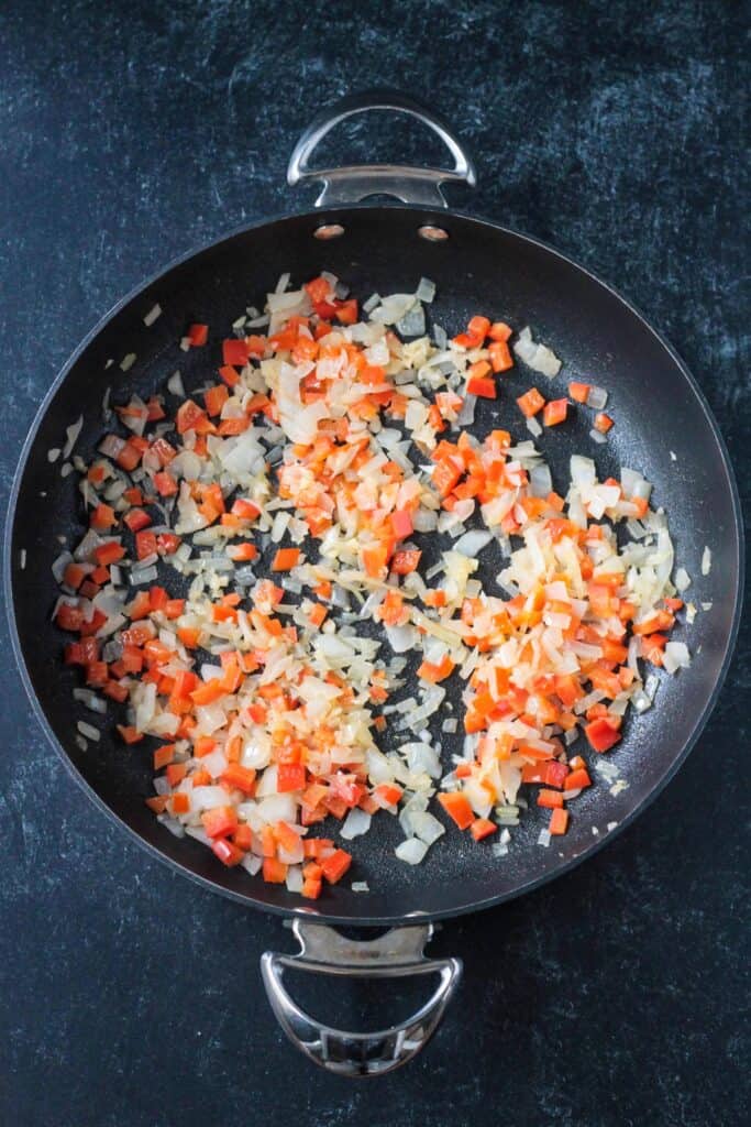 Sautéed onion and red bell peppers.