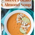 Overhead view of a sweet potato soup recipe in a white bowl on a blue napkin.