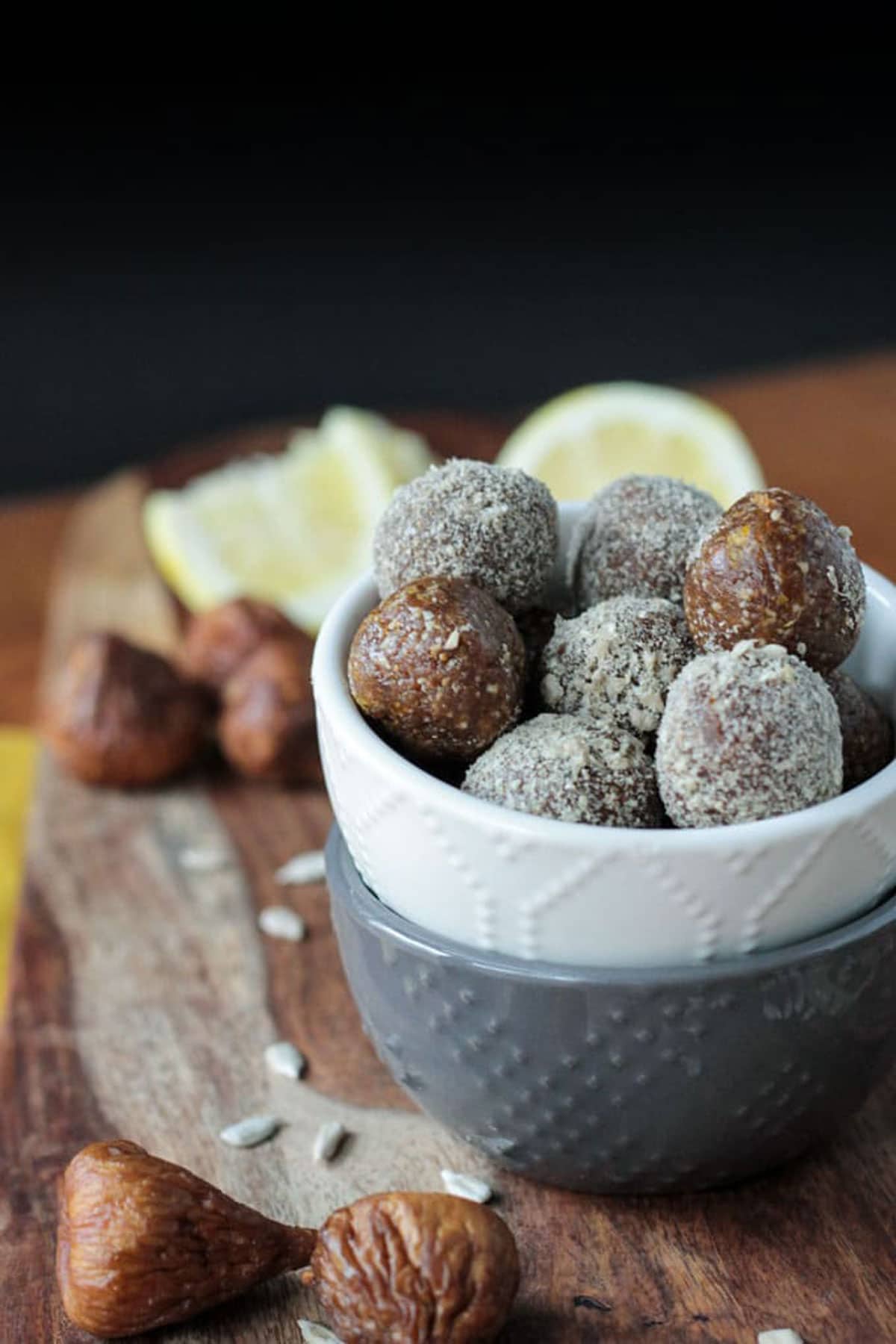 A pile of sunflower fig balls in a white bowl.