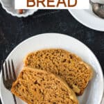 Two slices of butternut squash bread on a white plate.