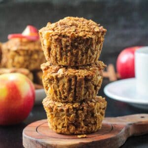 Three baked oat cups in a stack.