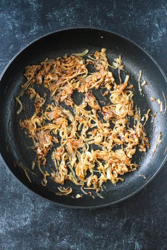 Finished caramelized onions in a skillet.