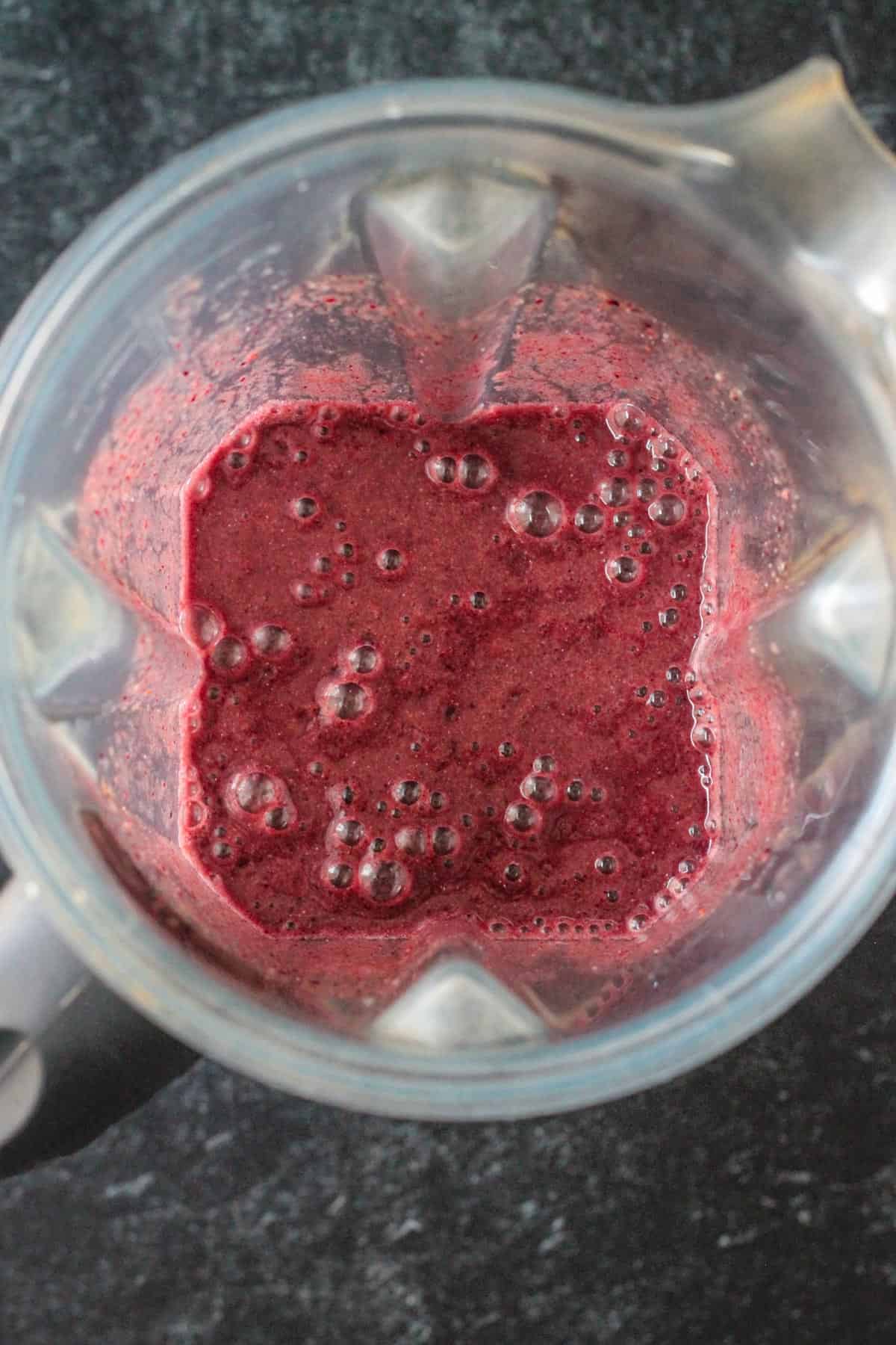 Overhead view of the blended smoothie in a blender.