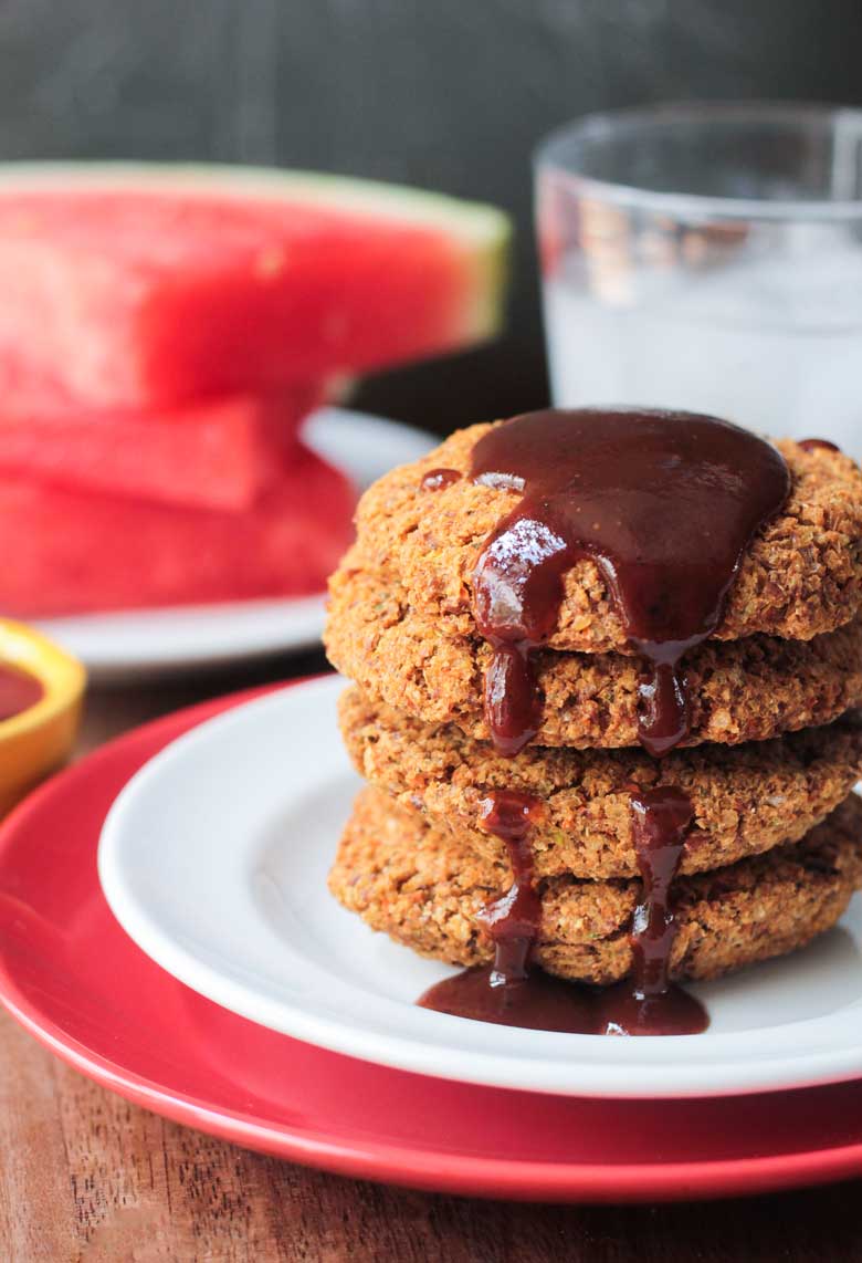 Pinto Bean Patties with BBQ sauce on a white and red plate