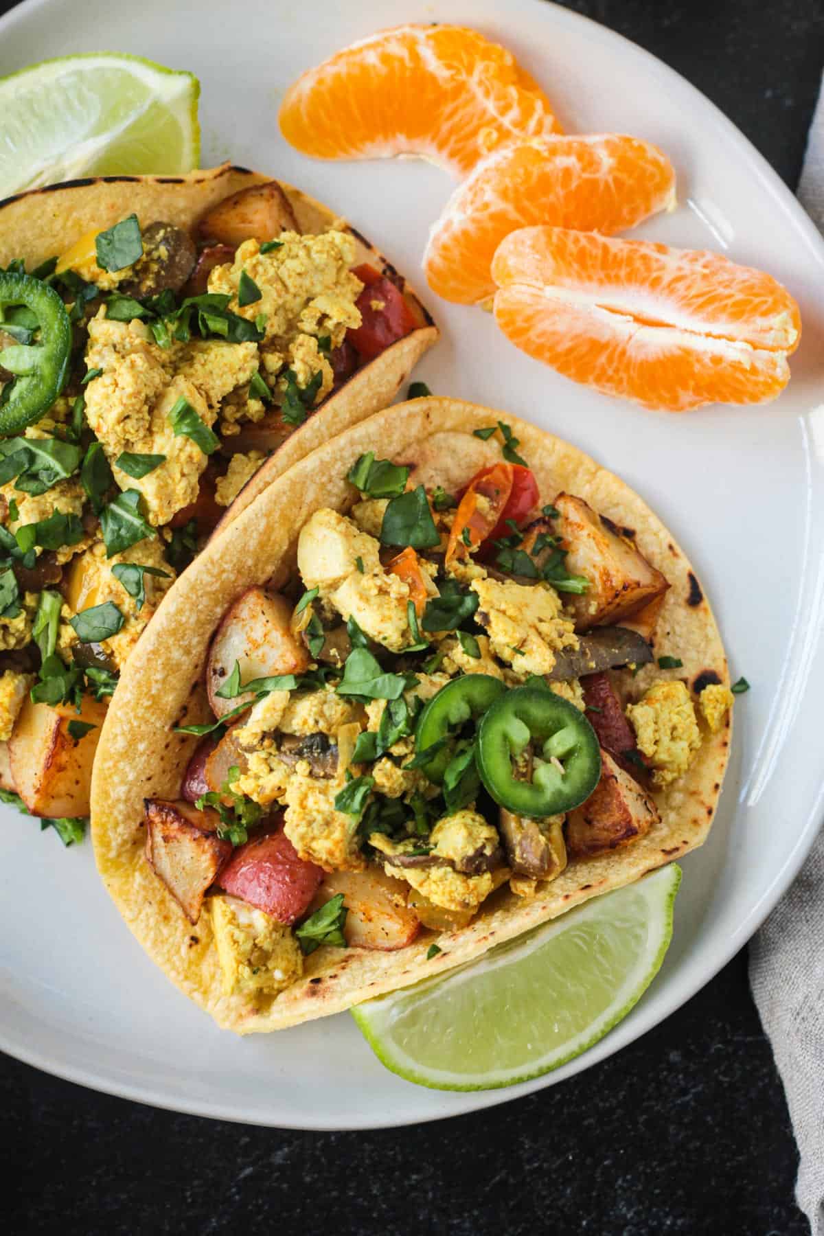 Close up of scrambled tofu in a breakfast taco.