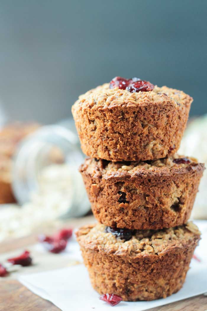 Stack of 3 cranberry baked oatmeal muffins.
