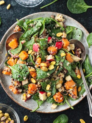 Butternut squash quinoa salad with spinach and chopped apples.