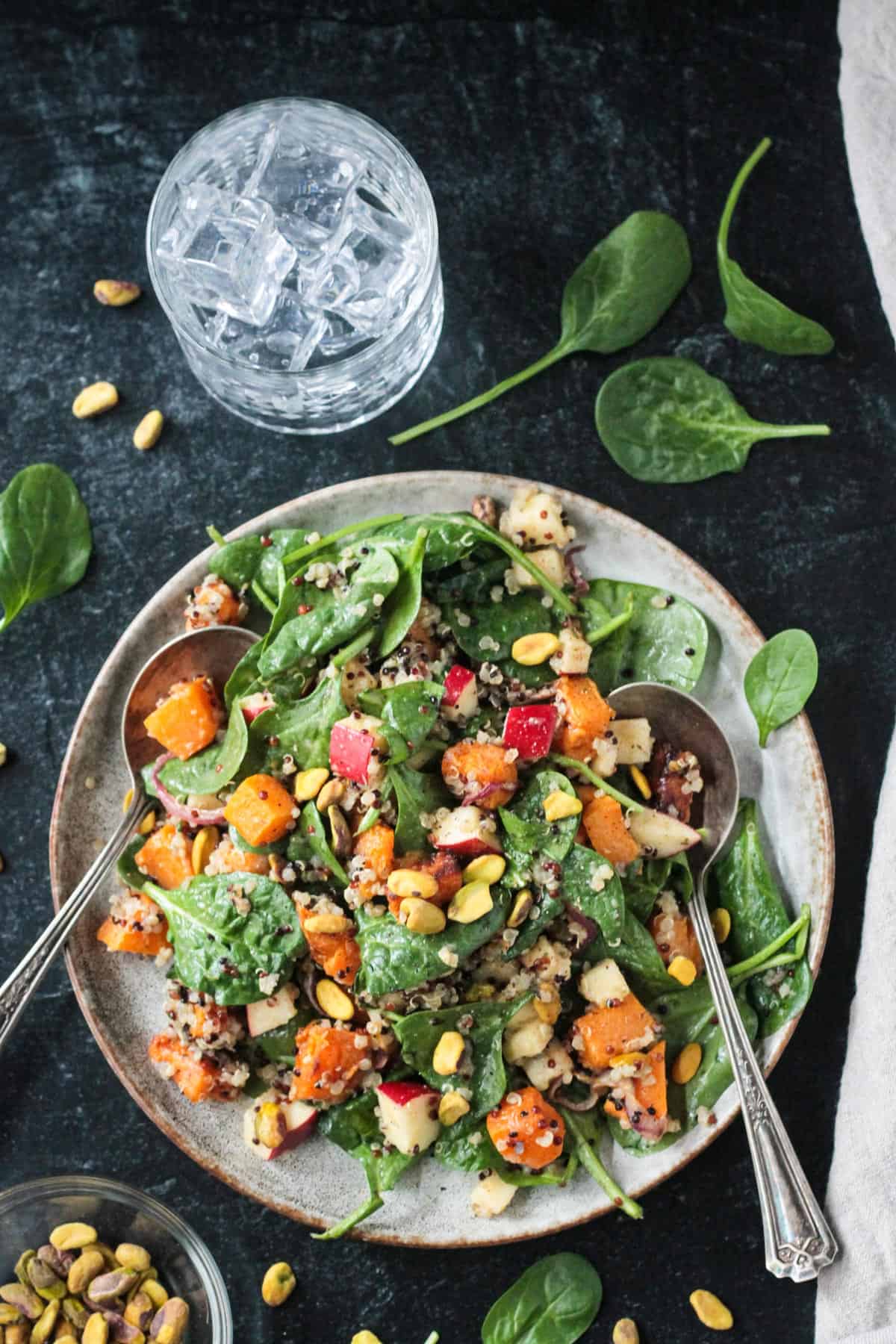 Butternut squash quinoa salad with spinach and chopped apples.