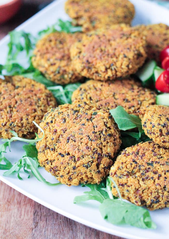 Close up of Baked Red Lentil Quinoa Fritters on a plate.