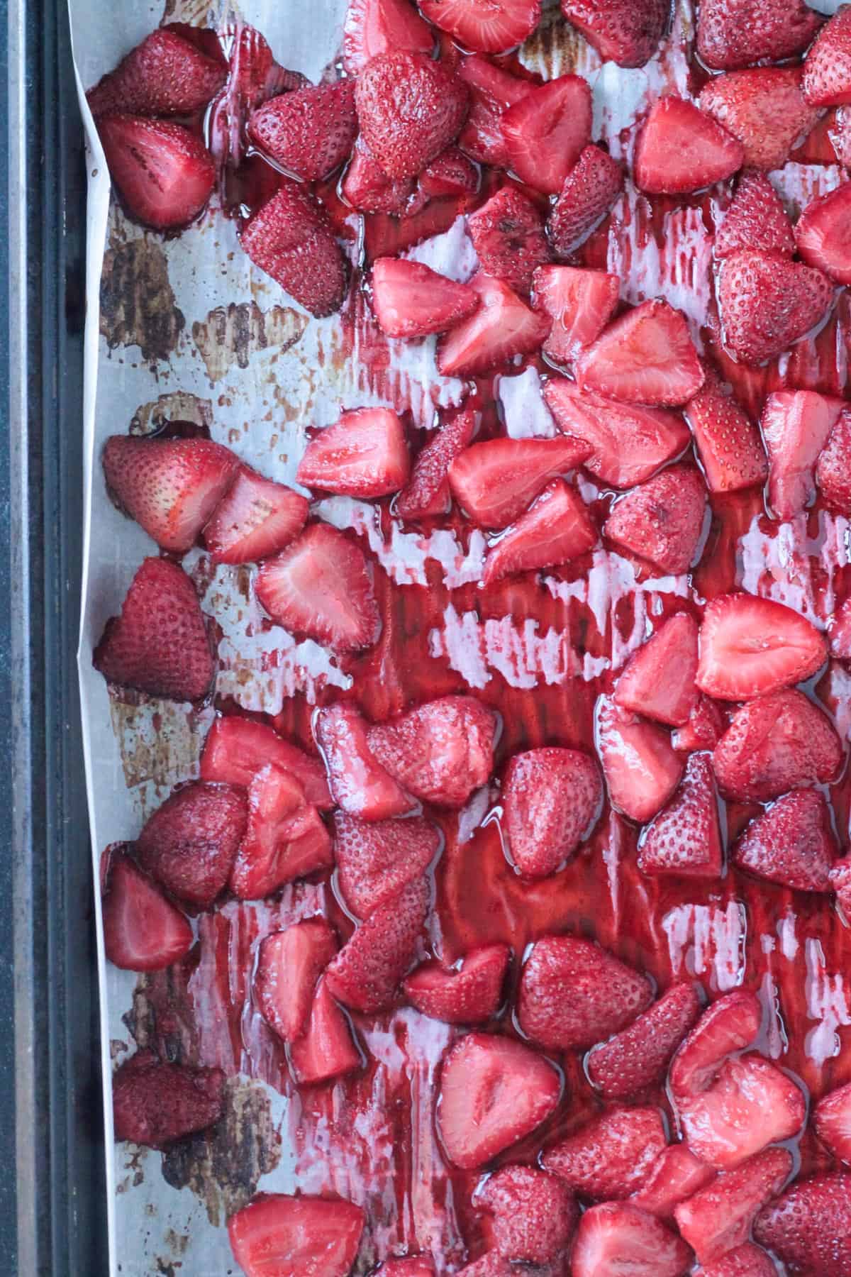 Close up of jammy roasted strawberries.