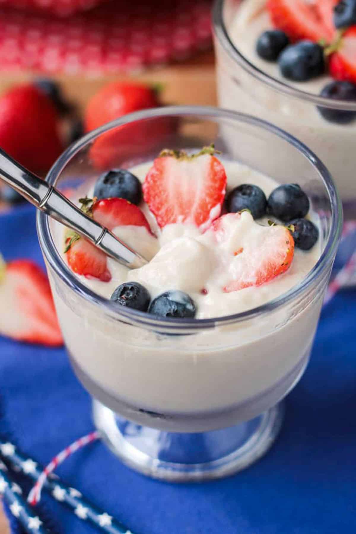 Spoon in a bowl of vanilla pudding.