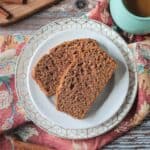 Two slices of apple cinnamon bread on a plate.