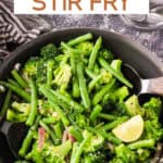 Green bean broccoli stir fry in a skillet.