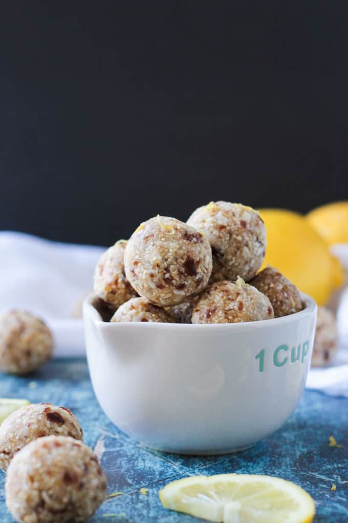 Close up of a bowl of lemon date balls.