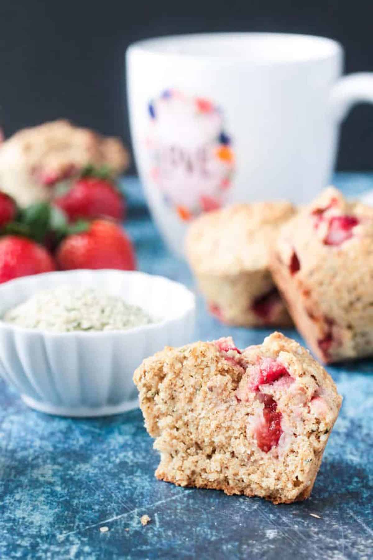 Halved muffin showing the soft, fluffy inside.