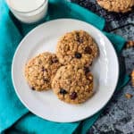 Three oatmeal breakfast cookies on a plate.