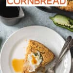 Slice of vegan jalapeno cornbread on a plate with two forks.