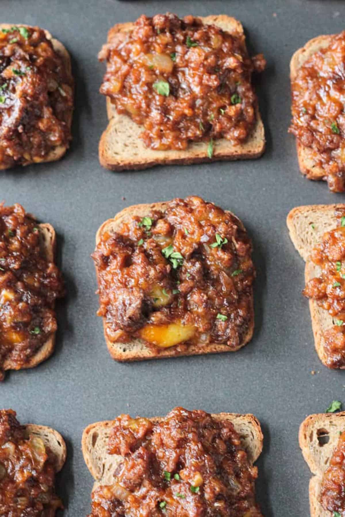 Close up of one finished appetizer on a baking tray.