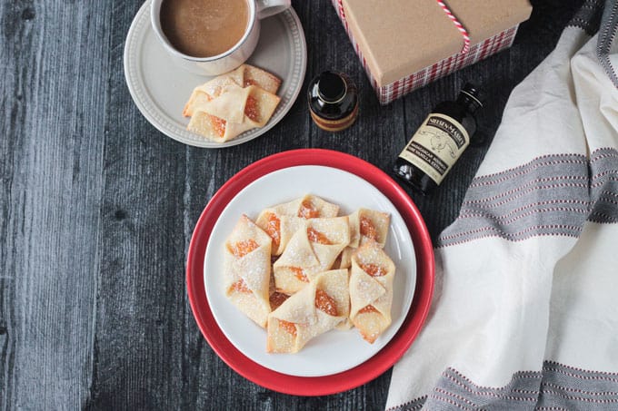 Plate of polish christmas cookies next to a mug of coffee