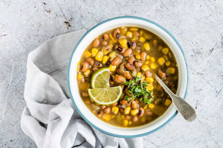 bean soup with lime wedges