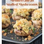 Spinach artichoke stuffed mushrooms with a breadcrumb topping.
