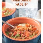 Spoonful of soup being lifted out of a bowl.