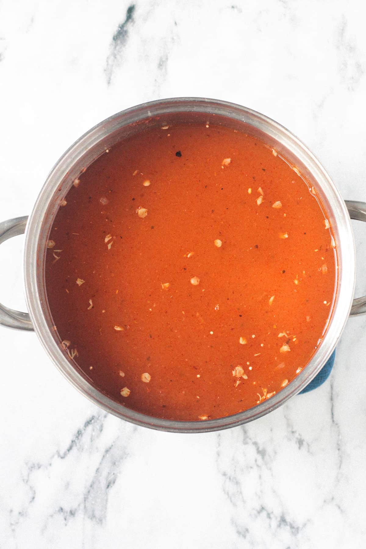 Broth added to the pot.