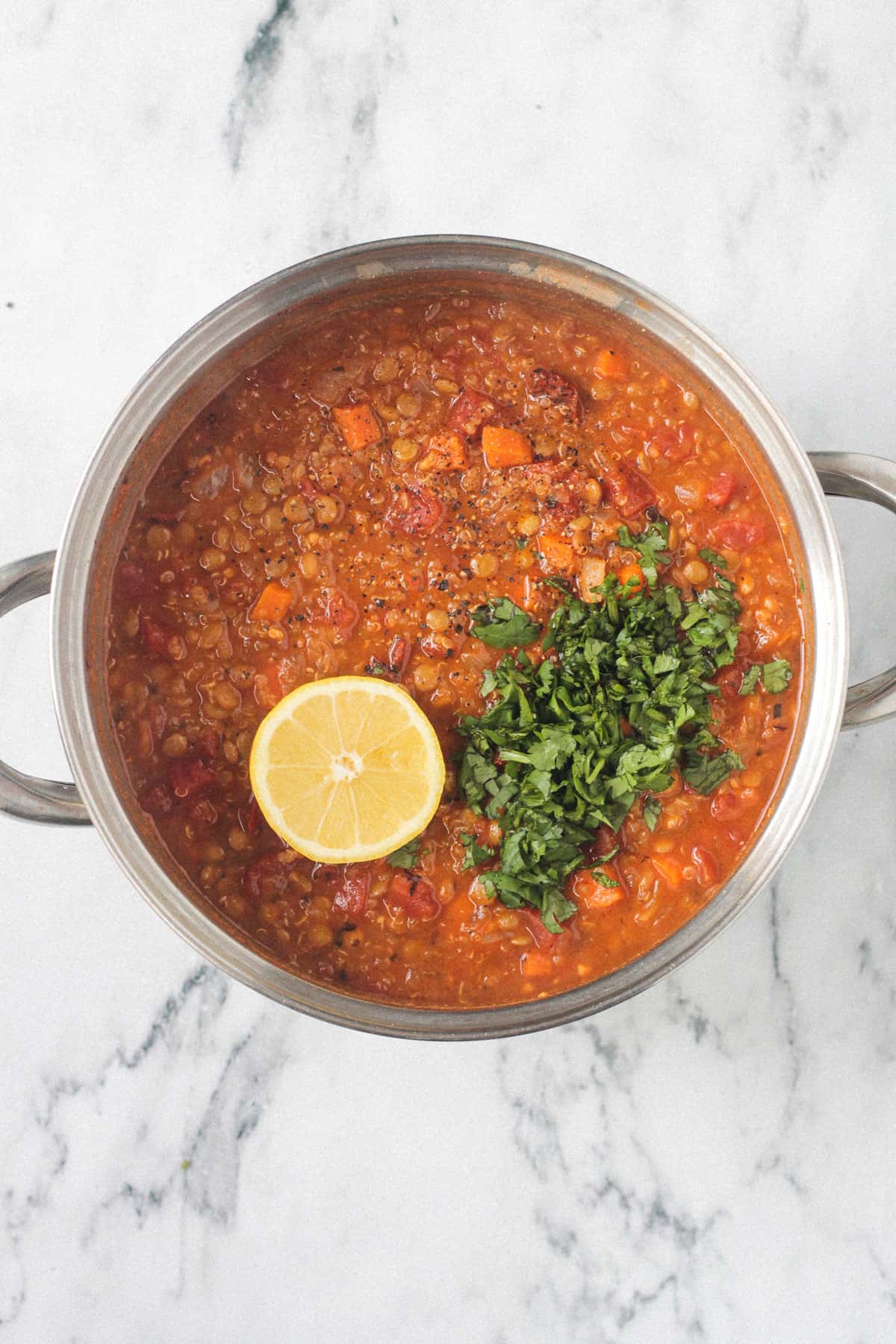 Chopped parsley and lemon juice added to the pot of soup.