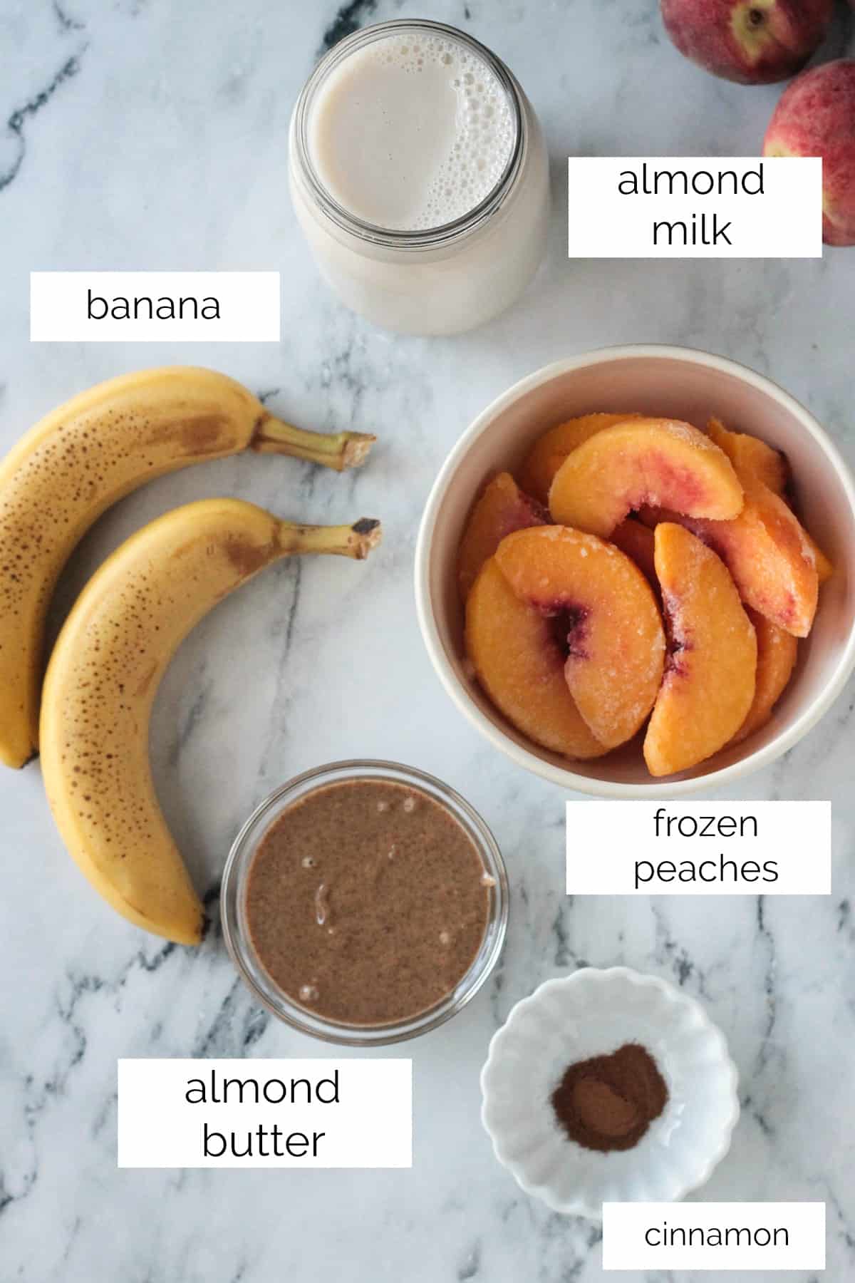 Ingredients: frozen peaches, banana, almond butter, almond milk, cinnamon