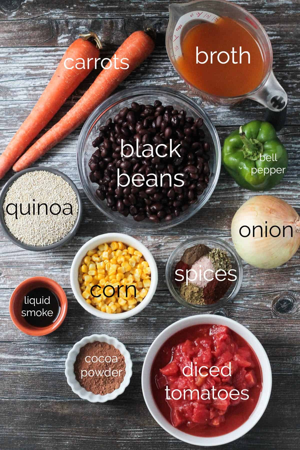 Individual recipe ingredients for Black Bean Quinoa Chili arrayed in separate bowls.