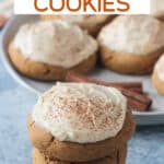 Stack of three vegan pumpkin cookies with frosting.