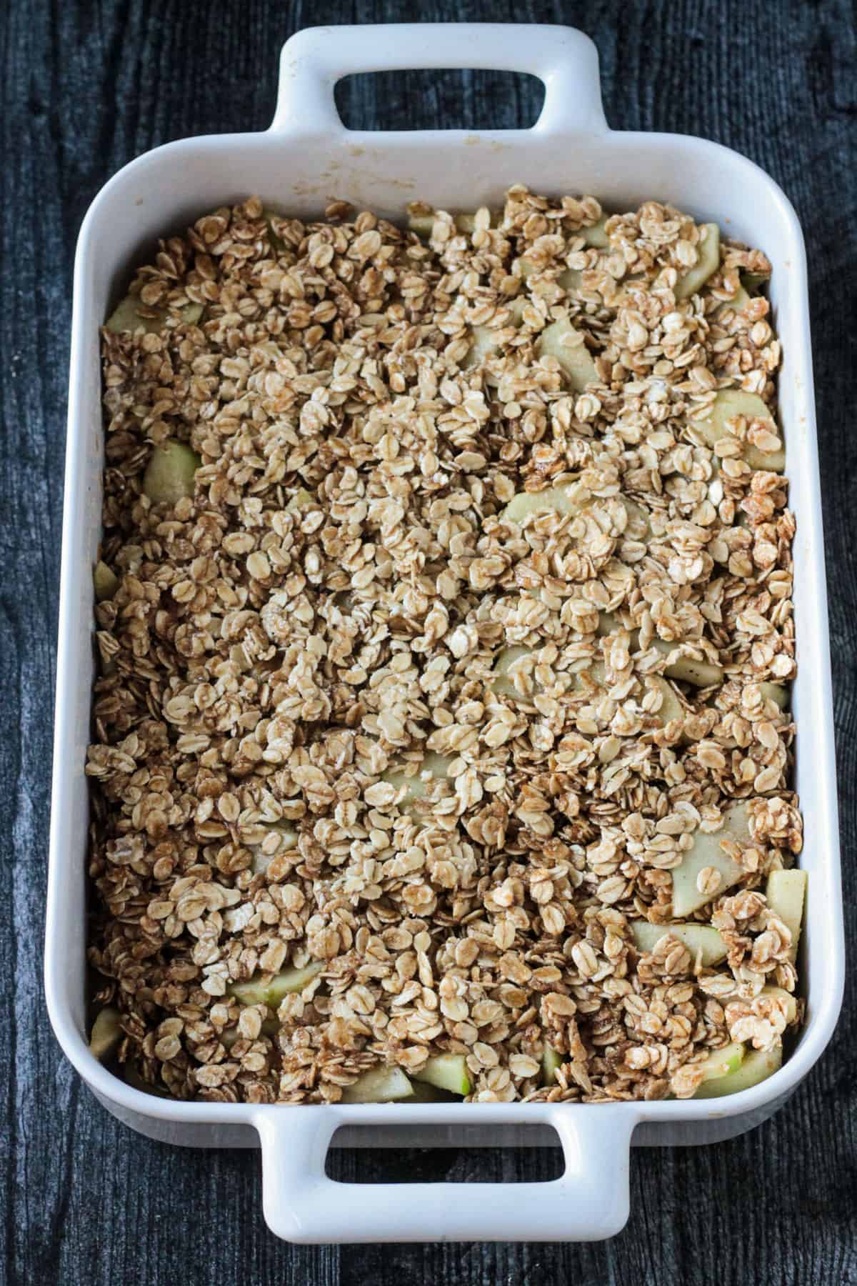 Pan of apple crisp mixture ready to go in the oven for baking.