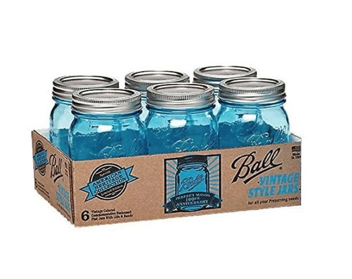 Set of 6 glass mason jars with lids.