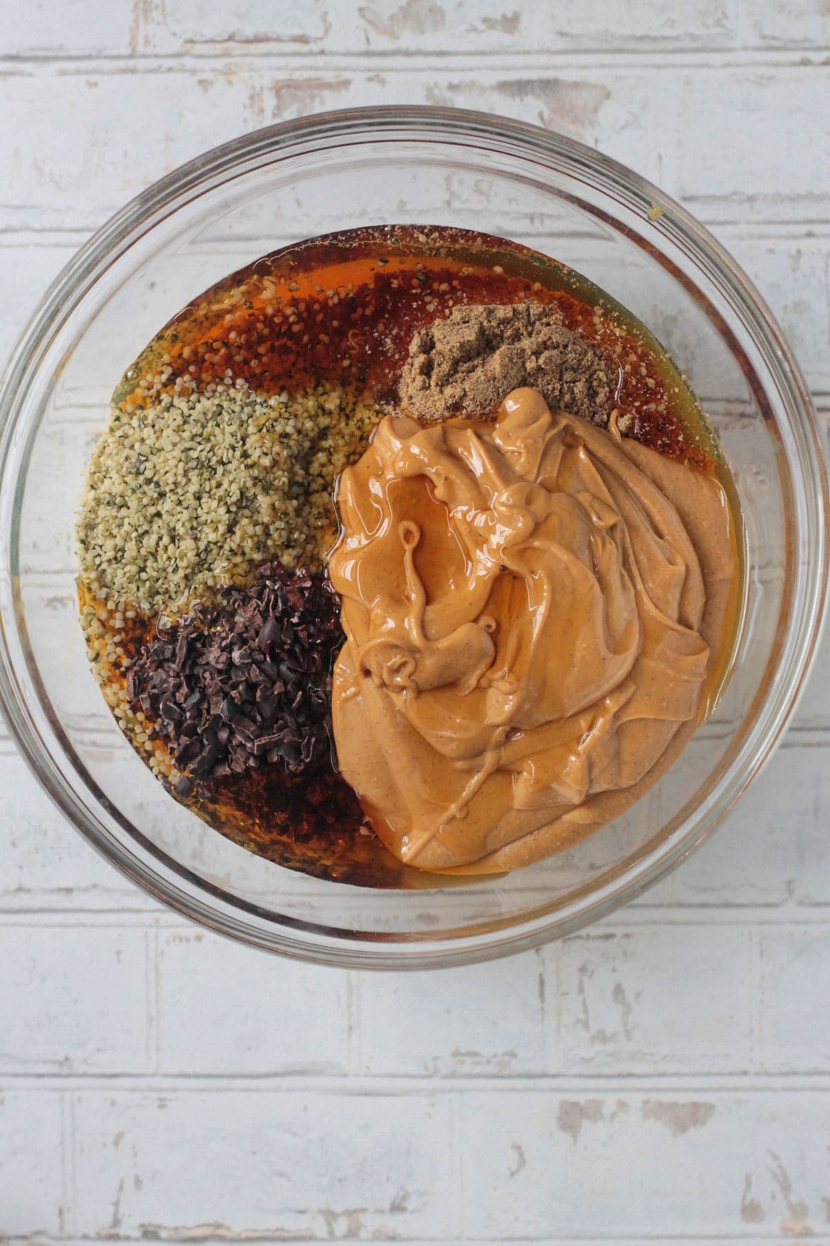 Wet ingredients poured into a mixing bowl.