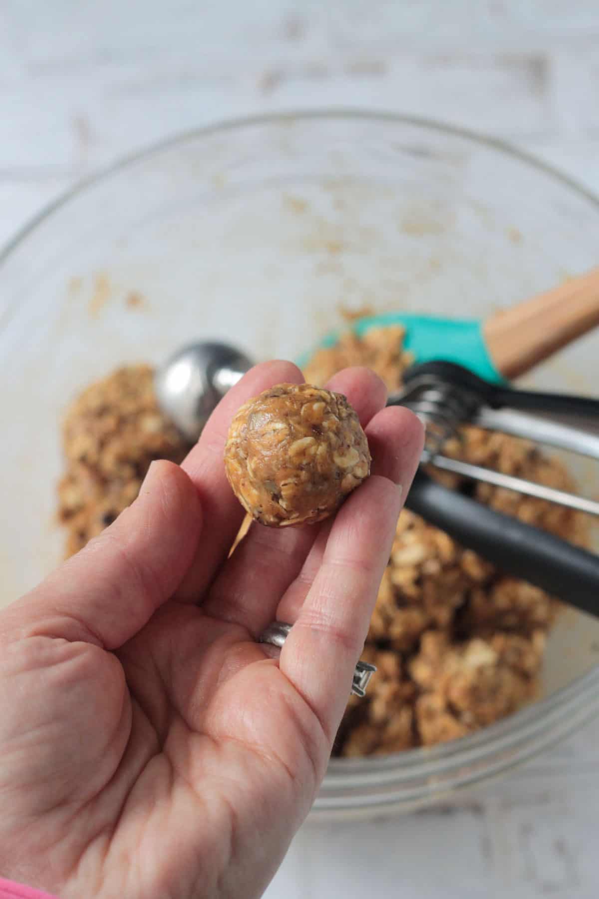 Forming the energy balls with clean hands.