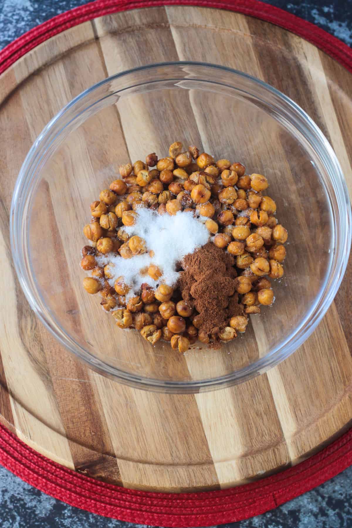 Chickpeas, sugar, and cinnamon in a mixing bowl.
