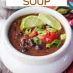 Black bean soup in a white bowl.