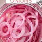 Overhead view of an open jar of quick pickled red onions.