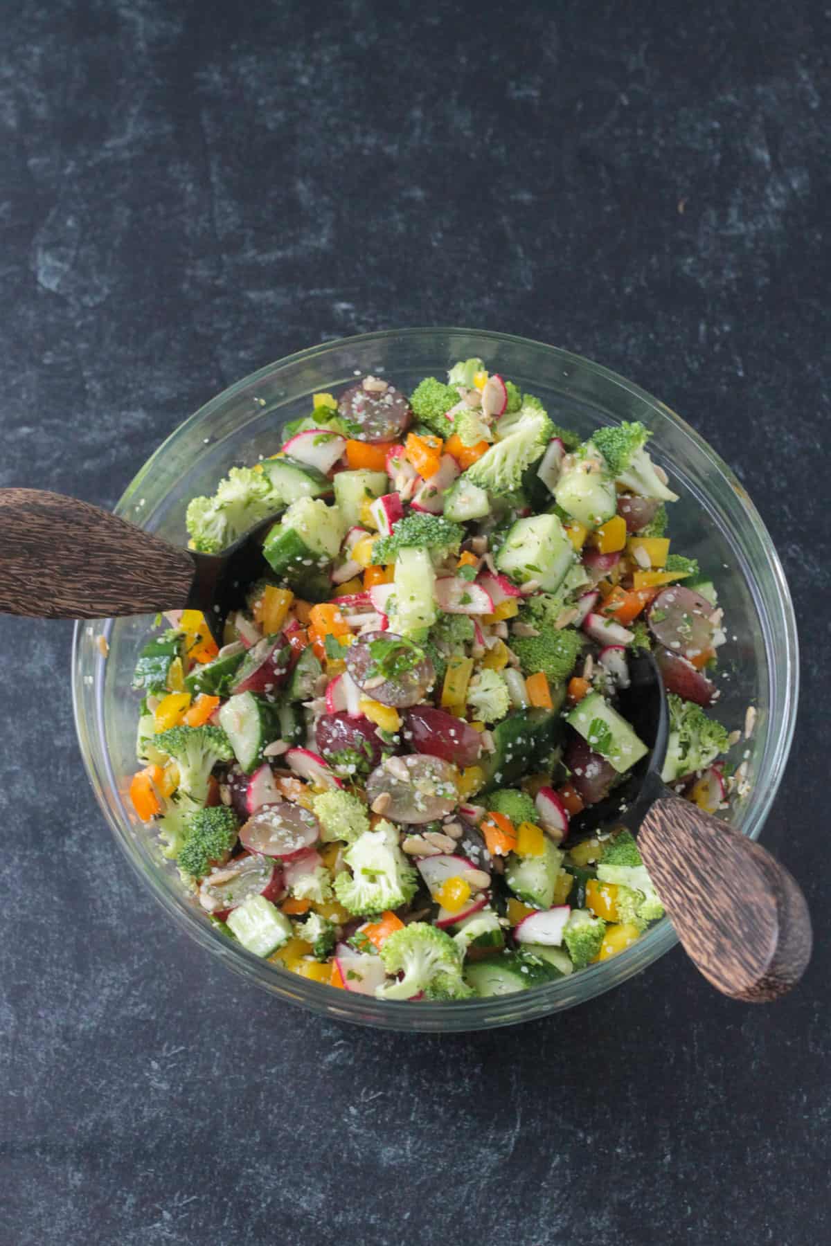 All salad ingredients mixed together in a bowl.