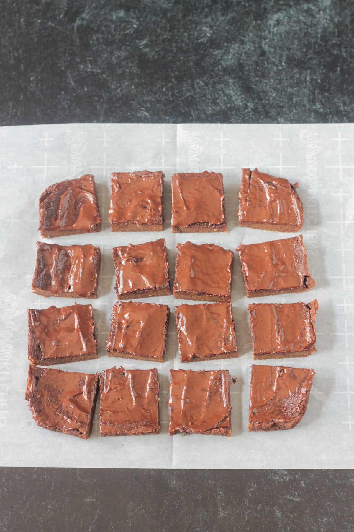 Batch of dessert bars cut into individual squares.