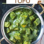 Palak Tofu in a copper serving bowl.