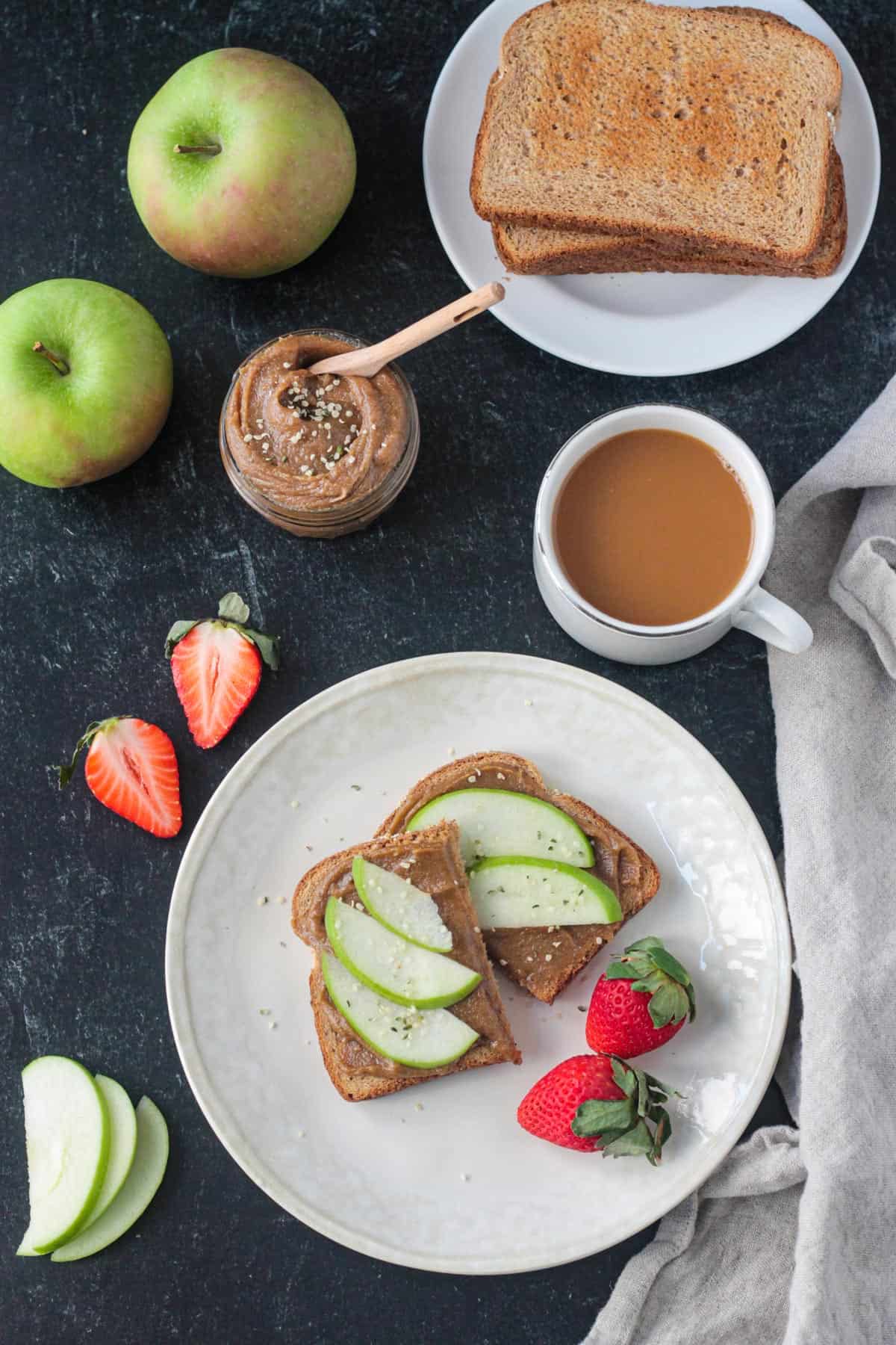 Two slices of toast with spiced cashew butter.