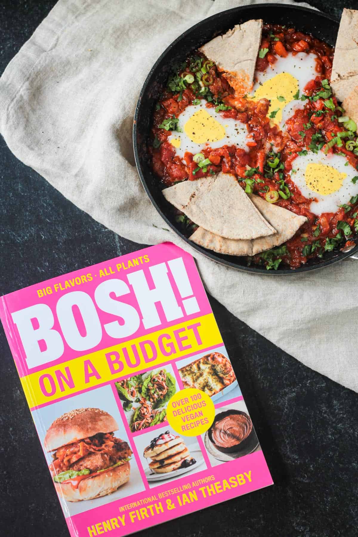 Finished dish next to the Bosh on a Budget cookbook.